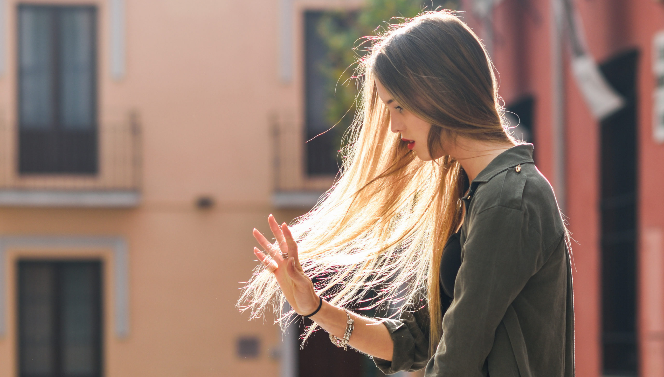 Blonde girl moving her amazing long hair